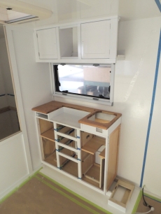 Dry fit, masked, prepped, bonded, screwed, and installed lower kitchen cabinet