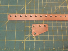 Fabricated copper ground bus bar distribution strips