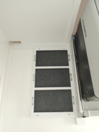 Installed battery tray and footman's loops