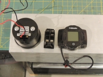 Fabricated GPS odometer, compressor, and pre-heater switch bracket dash panel