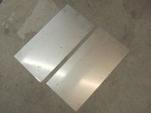 Fabricated stainless steel rear wheel shield plates